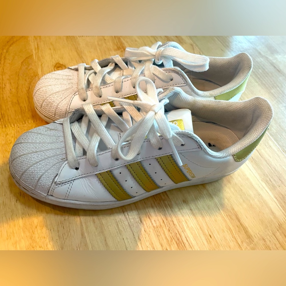 Adidas Shell Toe leather shoes with Gold Stripes